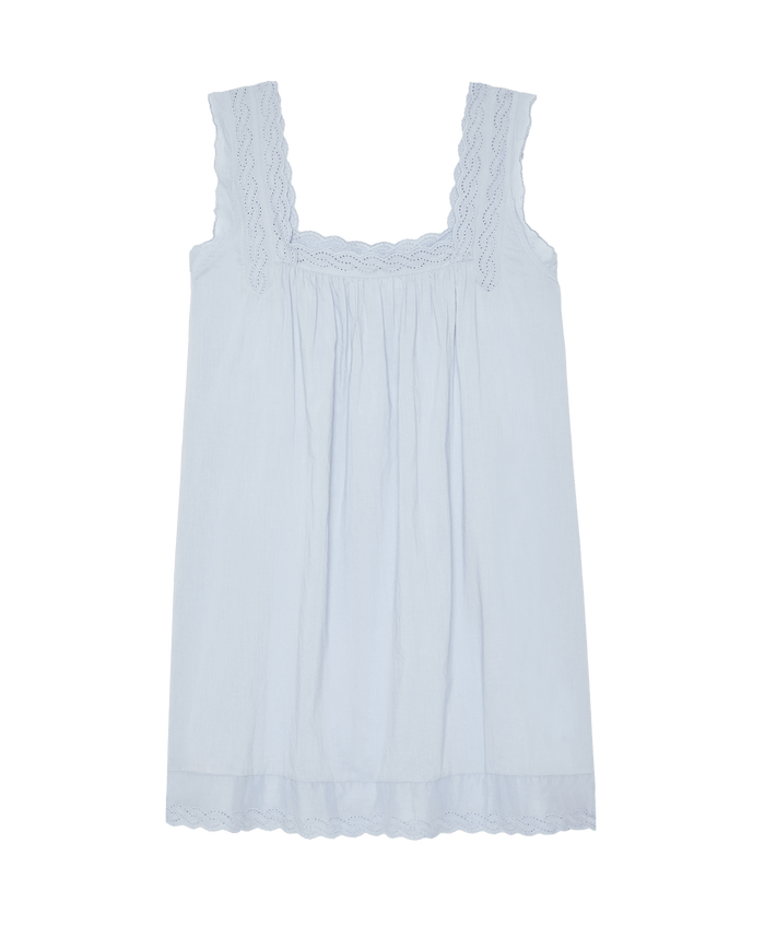 The Eyelet Mini Tank Dress in Rainwater by The Great. SP26 Sleep features a Victorian-inspired design with lace-trimmed square neckline and shoulders, plus a loose, gathered fit.