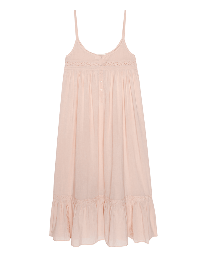 The Eyelet Ruffle Tank Night Dress in Washed Rose by THE GREAT. F26 SLEEP is a light pink, sleeveless design with thin straps, delicate button details on the chest, and an eyelet ruffle tank-style hem, shown against a plain white background.