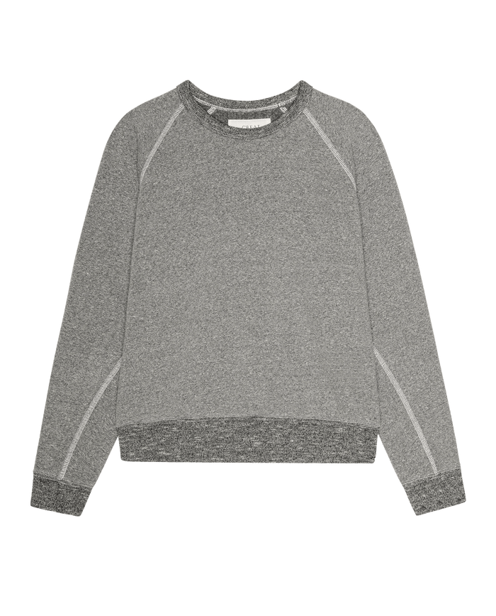 THE GREAT. The Fleece Rookie Sweatshirt in Solid Dark Heather Grey, a long-sleeve fleece style with ribbed cuffs and waistband from the F26 D1 FLEECE BACK KNITS collection, displayed on a white background.