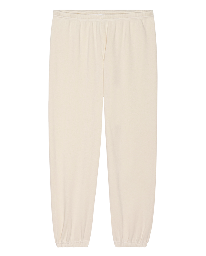 THE GREAT. H25 CORE FLEECEBACK "The Fleece Stadium Sweatpant" in Washed White, featuring an elastic waistband and cuffs, displayed flat on a white background.