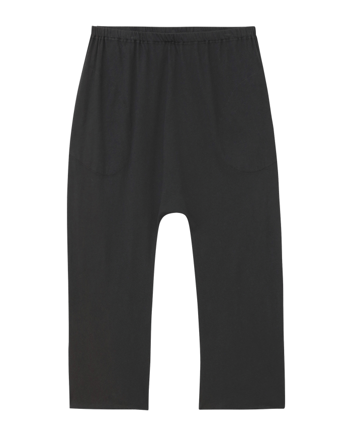 Almost Black jersey crop pants by THE GREAT. CORE KNITS feature a loose fit, wide legs, an elastic waist, side pockets and are crafted from 100% cotton in the U.S.A.