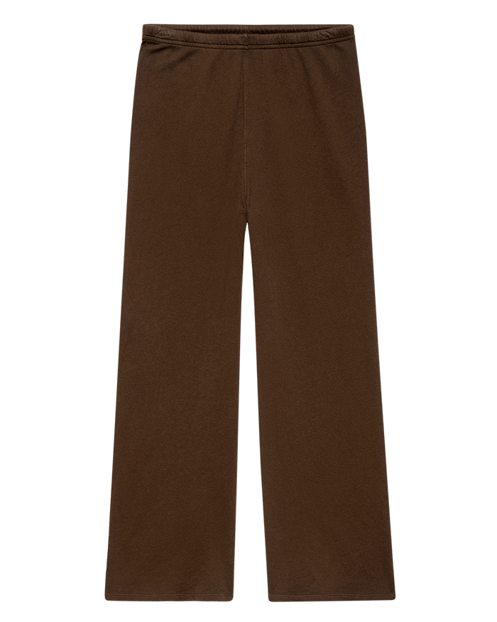 Introducing The Lap Sweatpant. Solid -- Driftwood by THE GREAT. F26 SEASONAL CORE: a handcrafted pair of brown, wide-leg sweatpants made in Los Angeles, featuring an elastic waistband and shown flat against a white background.