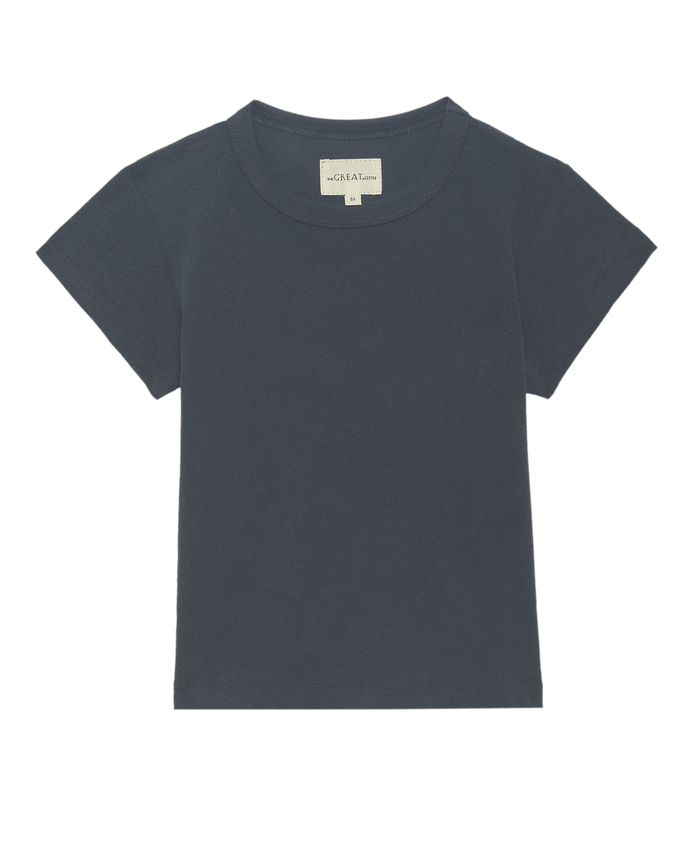 A plain, short-sleeved, washed navy The Little Boxy Crew t-shirt from THE GREAT. LITTLE is laid flat on a white background, showcasing a relaxed silhouette with a subtle vintage feel.