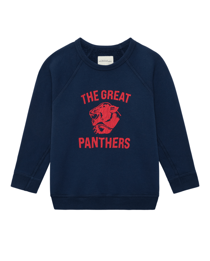 True Navy “The Little College Sweatshirt w/ Growling Panther” by THE GREAT. F26 D1, crafted from French Terry with a vintage wash, features bold red “THE GREAT PANTHERS” text and a vibrant red panther graphic on the front.