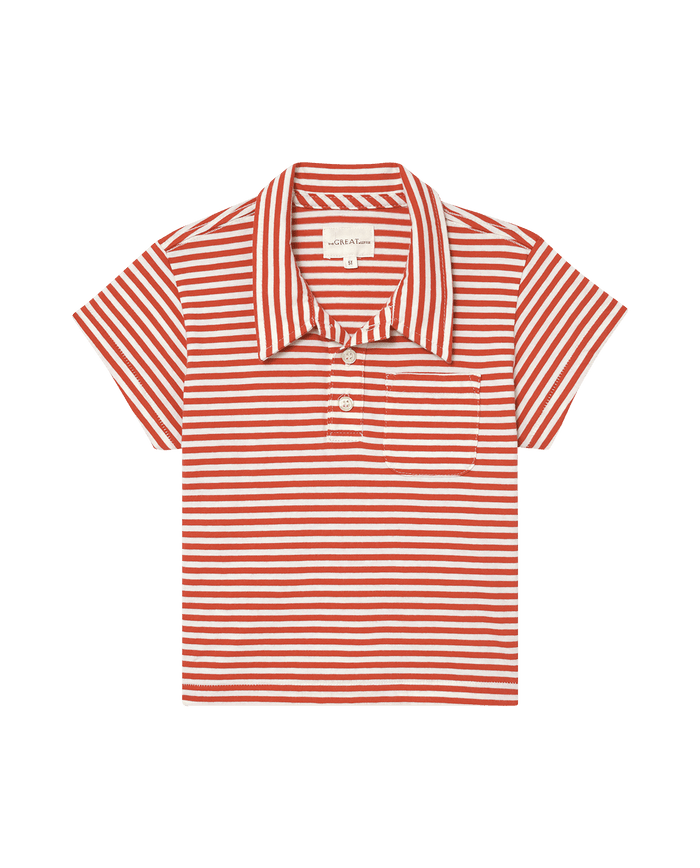 The Little Lacrosse Polo in Sun Cherry Stripe, a red and white striped polo from THE GREAT. SP25 POLO LOUNGE LITTLE, features a collar, two buttons, and a chest pocket. Perfect sporty yet stylish sportswear for lacrosse lovers.