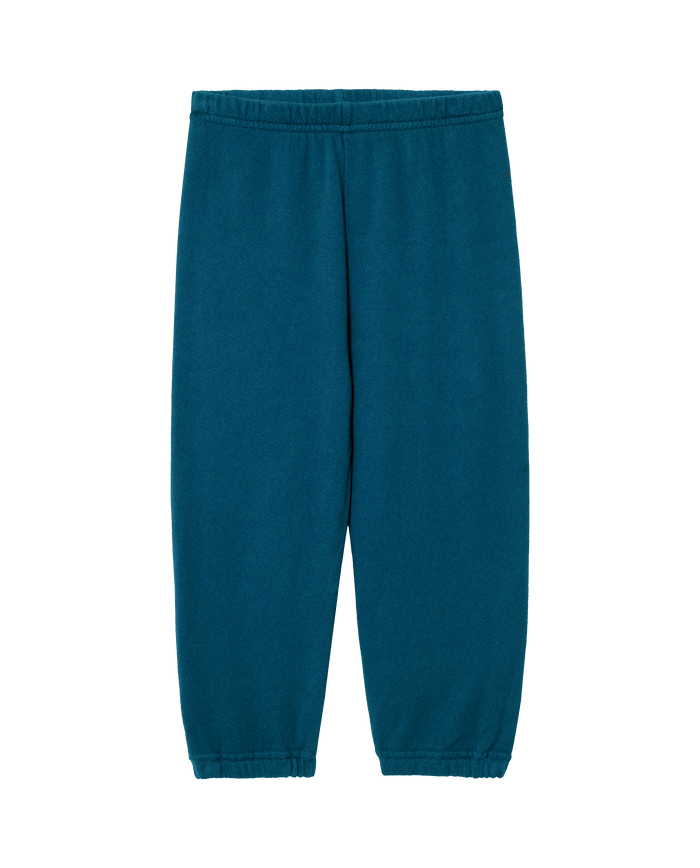The Little Stadium Sweatpant in Solid Dark Slate by THE GREAT. F25 LITTLES features an elastic waistband and cuffs for a vintage athletic vibe, and is shown flat on a white background.
