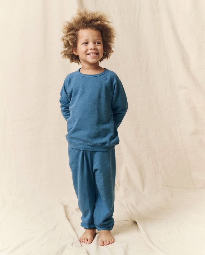 The Little Stadium Sweatpant. Solid -- Glacier Blue SWEATPANTS THE GREAT. HOL 23 LITTLE
