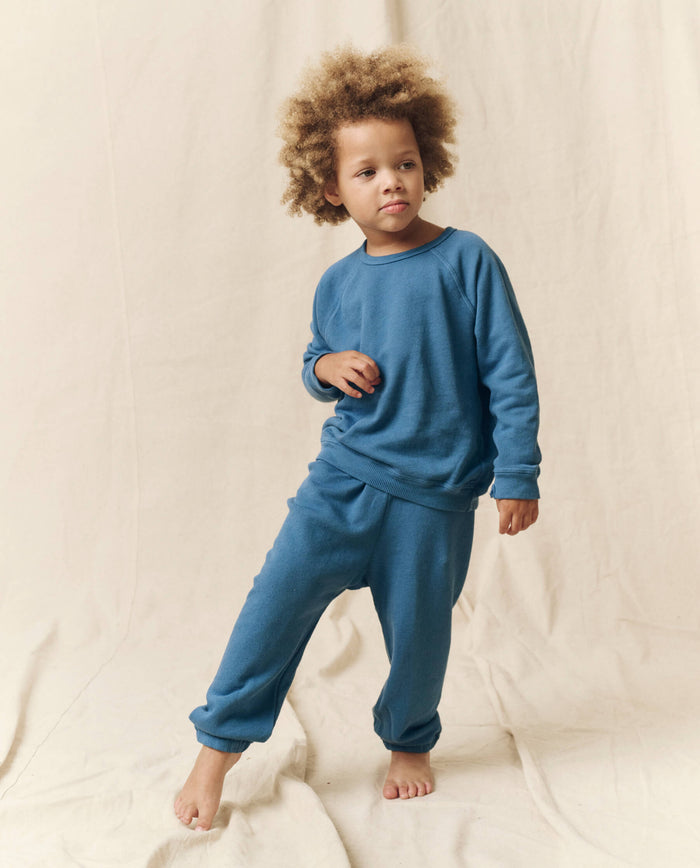 The Little Stadium Sweatpant. Solid -- Glacier Blue SWEATPANTS THE GREAT. HOL 23 LITTLE