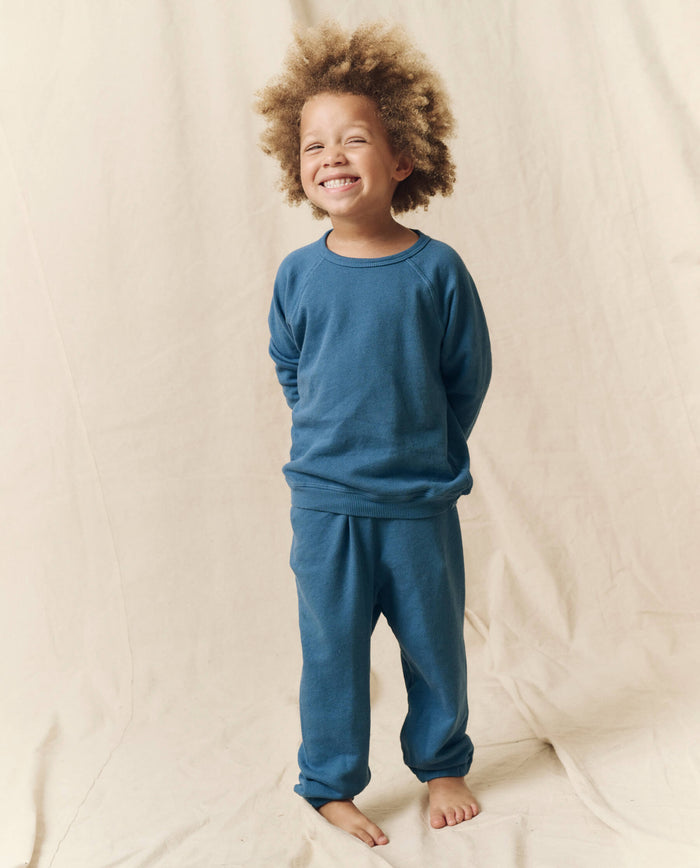 The Little Stadium Sweatpant. Solid -- Glacier Blue SWEATPANTS THE GREAT. HOL 23 LITTLE