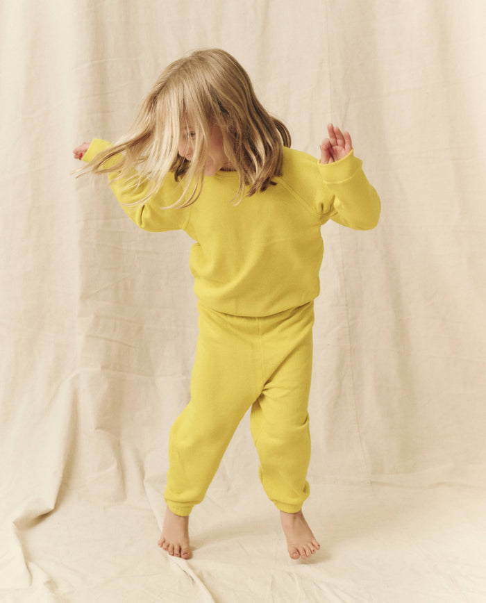 The Little Stadium Sweatpant. Solid -- Sunbeam SWEATPANTS THE GREAT. SP24 LITTLE