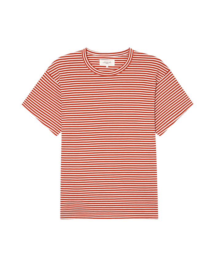 The Men's Boxy Crew by THE GREAT. SP25 POLO LOUNGE MEN, known as Sun Cherry Stripe, is a red and white striped T-shirt with short sleeves and a classic crew neck on a bold black background.