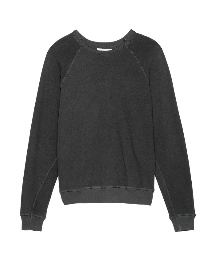 The Men's College Sweatshirt by THE GREAT. MAN is a washed black long-sleeve crewneck made in the U.S.A., featuring ribbed cuffs and hem.