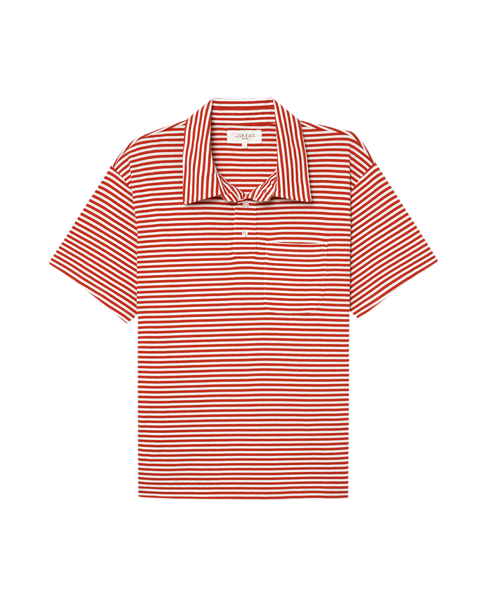 The Men's Lacrosse Polo by THE GREAT. SP25 POLO LOUNGE MEN, features a Sun Cherry Stripe design with red and white stripes on short sleeves, a collar, and a front pocket on a solid black background.