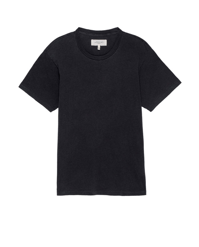 The Men's Slim Tee by THE GREAT. HOL 21 MENS in the color "Almost Black" features short sleeves and a round neckline, crafted from 100% cotton.