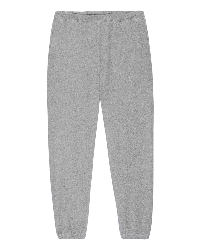 The Men's Stadium Sweatpant in Varsity Grey by THE GREAT. HOL 21 MENS is a stylish pair of sweatpants that features an elastic waistband and cuffs, perfectly blending modern comfort with vintage athleticwear style.