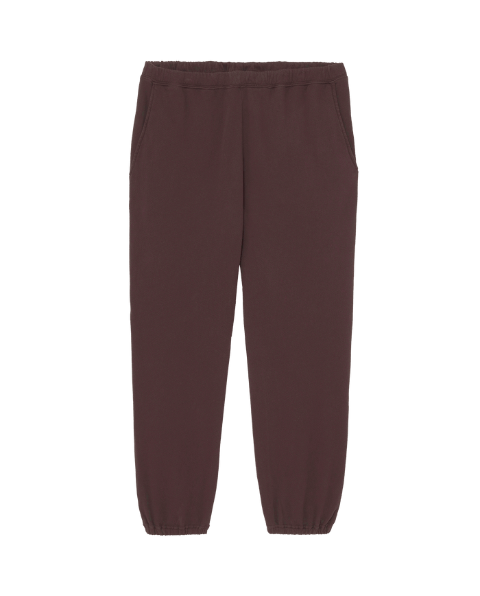 The Men's Stadium Sweatpant in Driftwood by THE GREAT. F25 MENS—brown jogger-style with elastic waistband, side pockets, and elastic cuffs—shown on a plain white background.