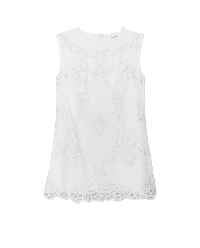 The Picnic Shift Dress in cream by THE GREAT. PS26 features intricate embroidery, Battenburg lace detailing, and a scalloped hem, shown against a plain white background.