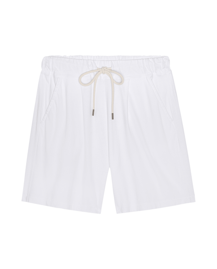 The Relaxed Sport Short in True White by THE GREAT. SP26 DANCER BODIES is handcrafted in Los Angeles from heavyweight jersey with side pockets, elastic waistband, and metal-tipped drawstring, shown on a plain white background.