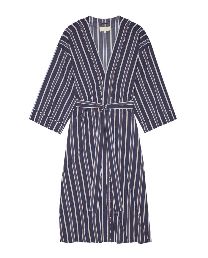 The Robe. -- Coastline Stripe by The Great. SP26 Sleep features navy blue and white vertical stripes, three-quarter wide sleeves, and a fabric waist belt—ideal for stylish loungewear. Shown on a white background.