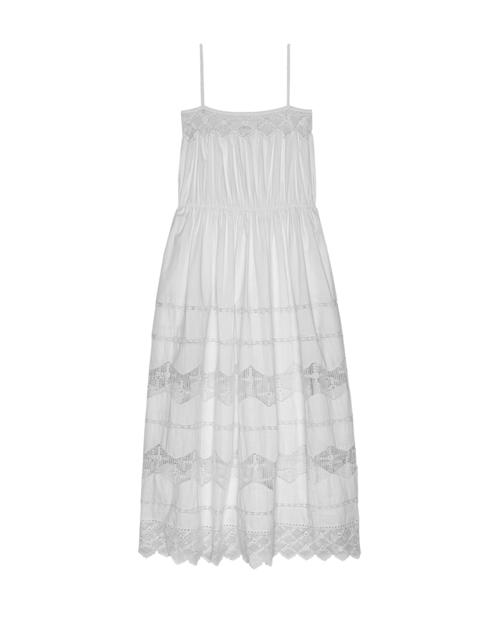 The Rosette Crochet Dress in cream by THE GREAT. SP26 D2 features thin shoulder straps, lace detailing, and a gathered waist, shown sleeveless against a plain white background.