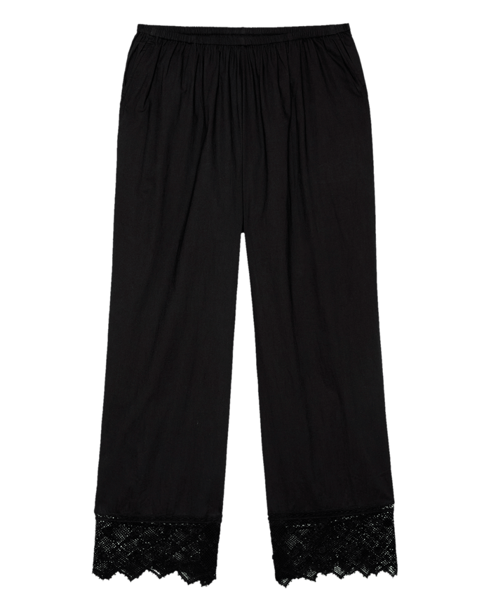 The Rosette Crochet Pant in black by THE GREAT. SP26 D2 features a pull-on silhouette, elastic waistband, and cotton rosette lace trim at the hem, shown laid flat on a white background.