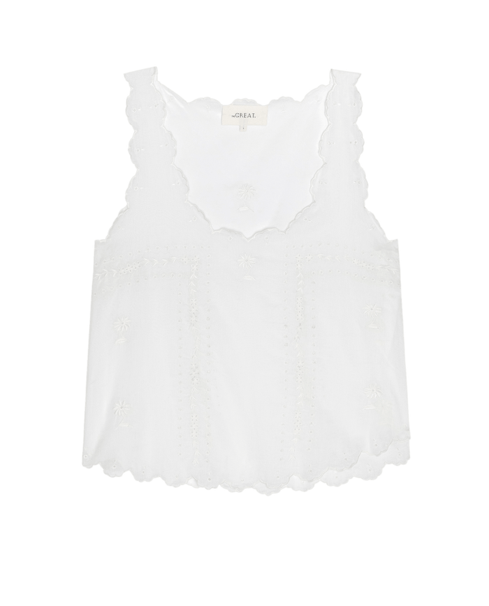 The Eyelet Tank by THE GREAT. SU26—white, sleeveless women's top with scalloped edges, embroidered floral details, and a square neckline, shown on a plain white background.
