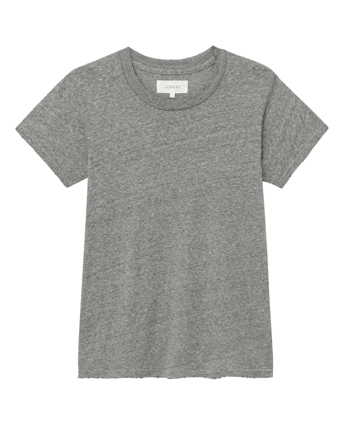 The Slim Tee in Heather Grey by THE GREAT. CORE KNITS, a solid short-sleeve crewneck t-shirt laid flat on a white background—crafted in the USA for everyday comfort.