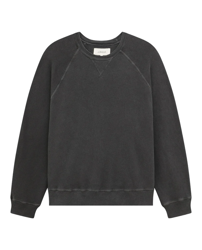 Here's an option rewritten using the given product data:

"The Slouch Sweatshirt in solid washed black by THE GREAT. CORE KNITS is a vintage-inspired, long-sleeve crew neck made in the U.S.A. from 100% cotton, without any visible branding.