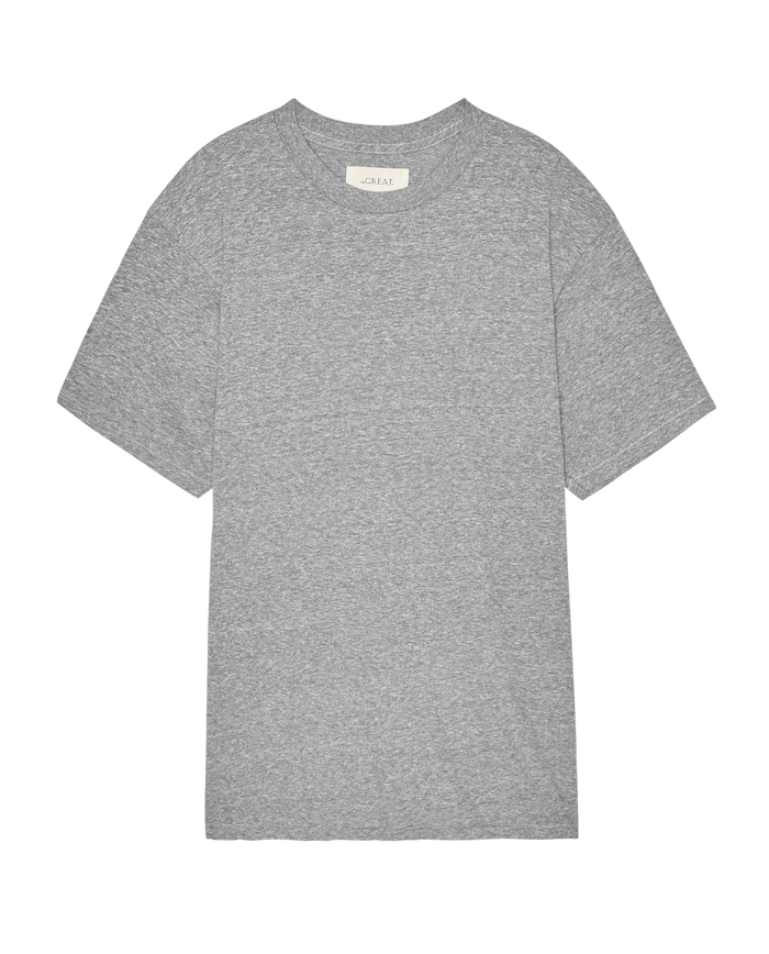 The Slouchy Crew Tee in Heather Grey by THE GREAT. SP26 SEASONAL CORE, an oversized short-sleeve crewneck T-shirt, is laid flat on a white background.