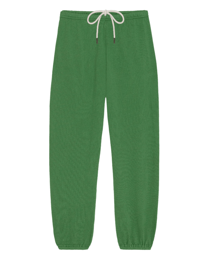 The Stadium Sweatpant in Fennel by THE GREAT. SU26 SEASONAL CORE features an elastic waistband, white drawstring, and elastic cuffs—ideal for athletic wear. Shown on a plain white background.