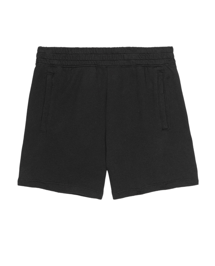 The Victory Short. Solid -- Almost Black by THE GREAT. SU25 CORE KNITS features an elastic waistband, two side pockets, and a comfortable fit, making it perfect for athletic wear. Shown laid flat on a white background.