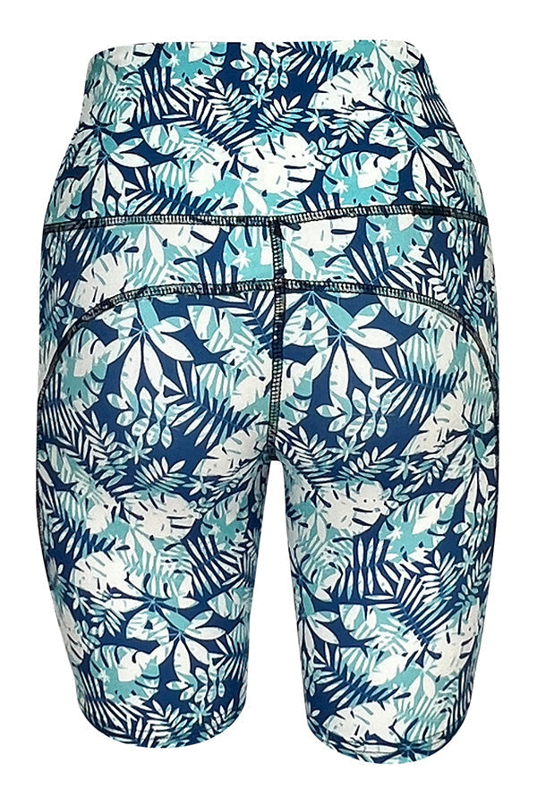 Tropical Breeze Shorts with blue and white tropical palm leaf print and deep side pockets