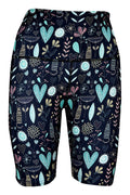 Wildflower Whiskers Shorts with floral, heart, and striped kitty designs on blue background, featuring deep side pockets and extra stitching for structure